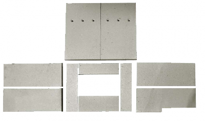 Šamotová vyzdívka Thorma Borgholm servis THORMA Filakovo - Profikrby s.r.o. Blansko  sada šamotových cihel s otvory pro přívod vzduchu, a výřezem pro kličku